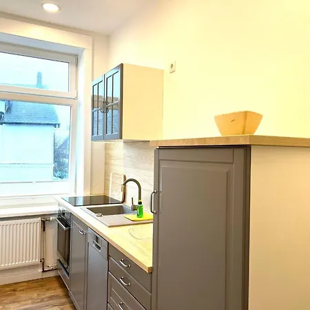 Kapitaenshaus-lassen-zimmer-penelope Konukevi Westerland